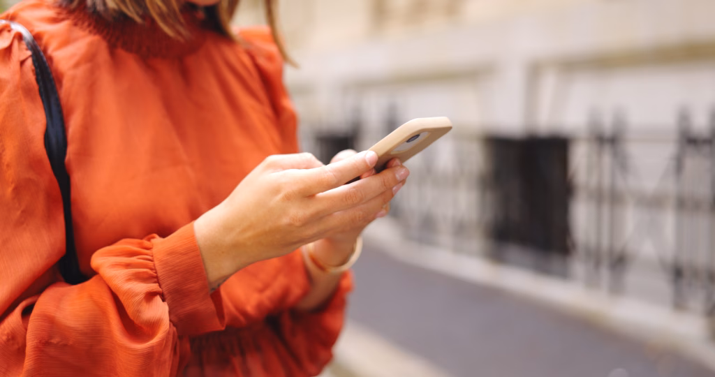hands typing on the phone